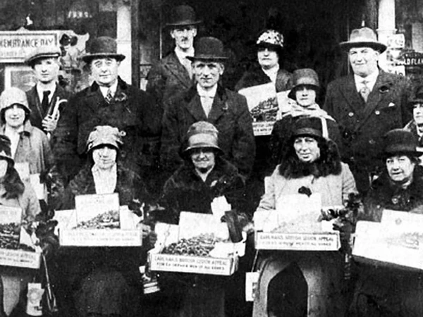 Old  black and white image of Royal British Legion Poppy Appeal collectors