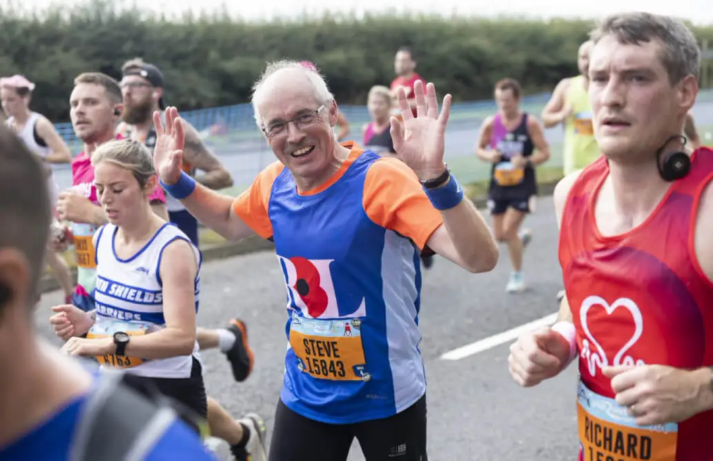 Steve running in RBL gear at event