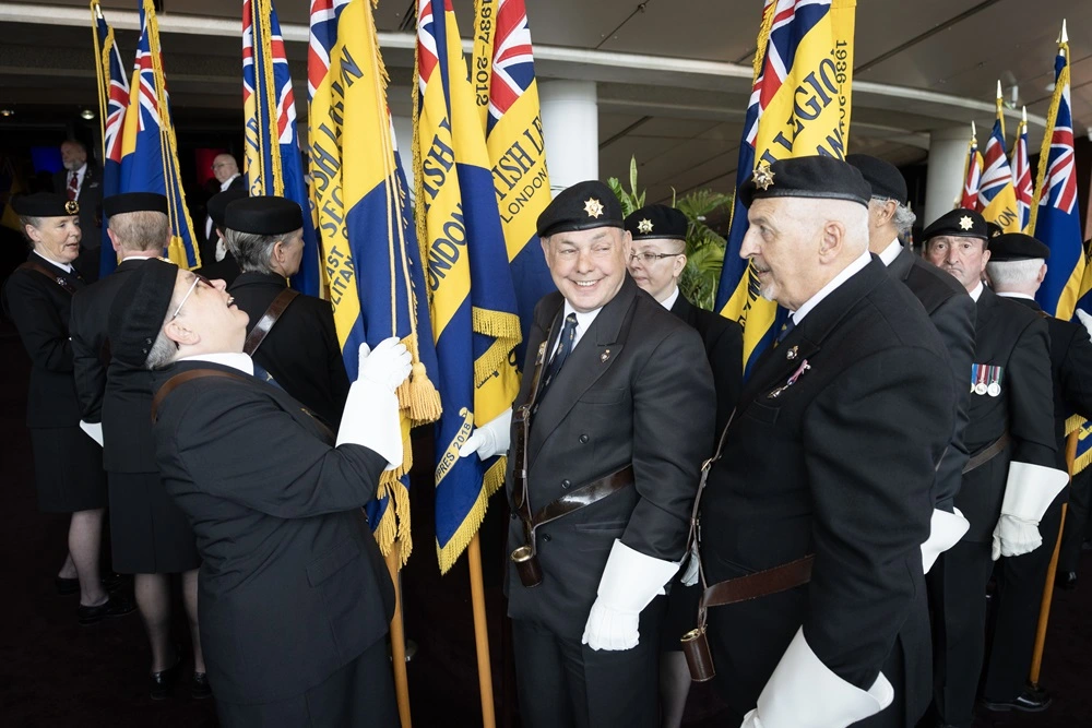 Standard Bearers sharing a joke before Conference begins