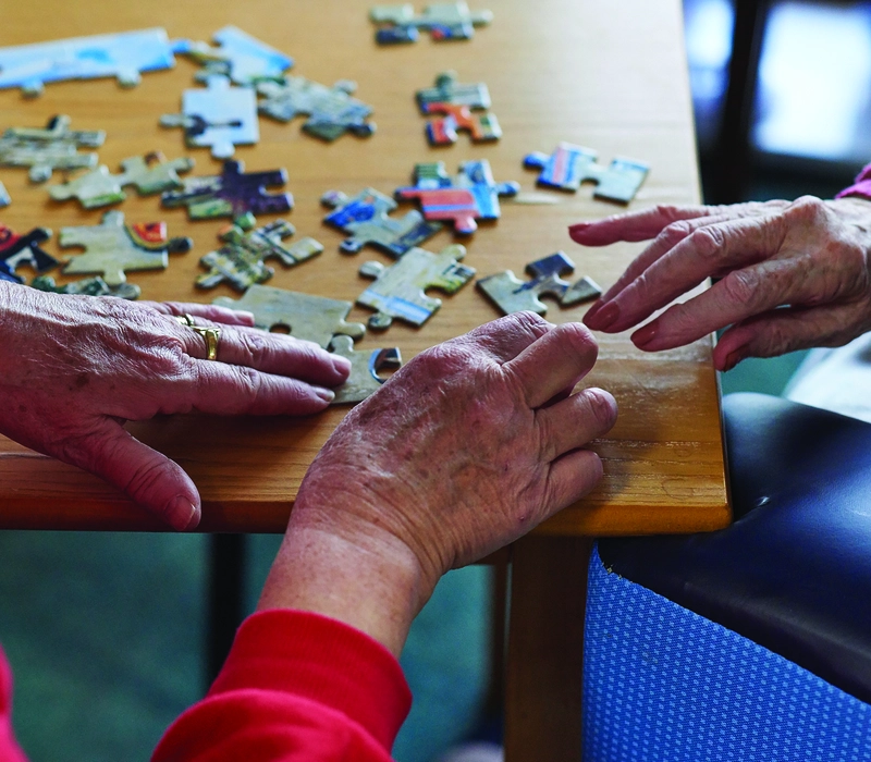 Lister_House_activities_quote Residents completing a jigsaw at a Royal British Legion care home