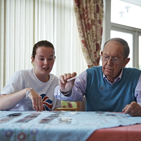 A resident with support worker at a Royal British Legion care home