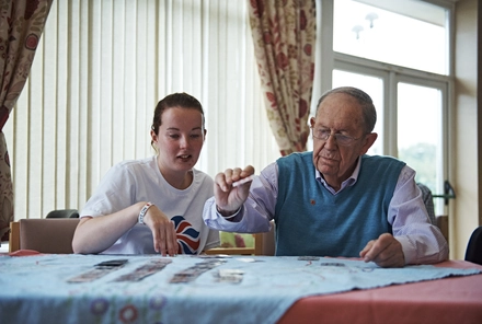 A resident with support worker at a Royal British Legion care home