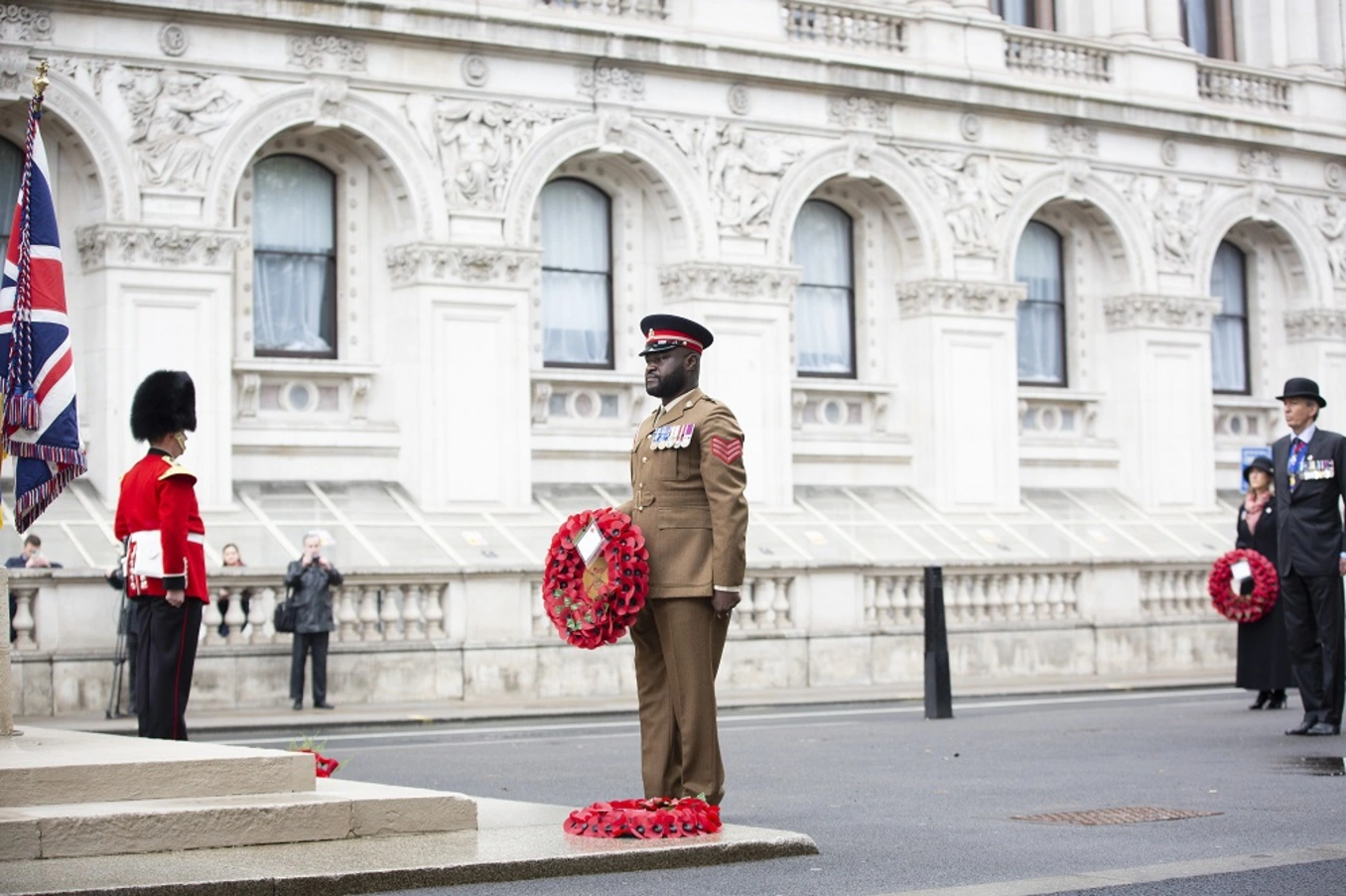 Sgt Ben Poku laying a wreath on behalf of the Army
