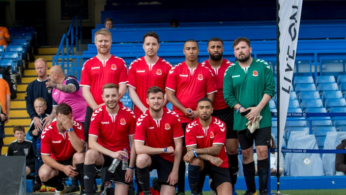 Corporate-charity-football-team-2019 Challenge Cup '19 winning team posing.