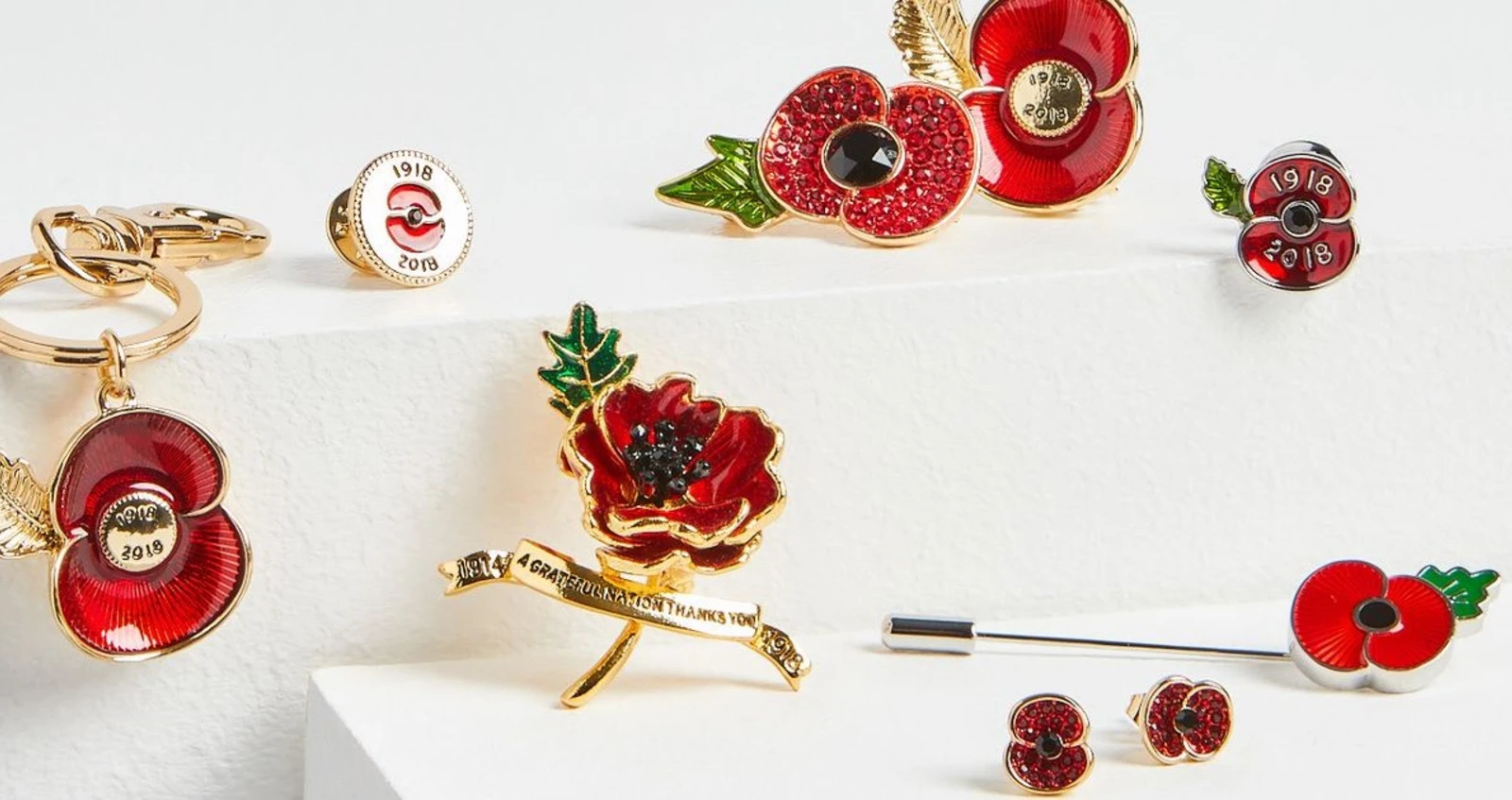 M&S poppy merchandise (keychain, lapel pin, broach, earrings)