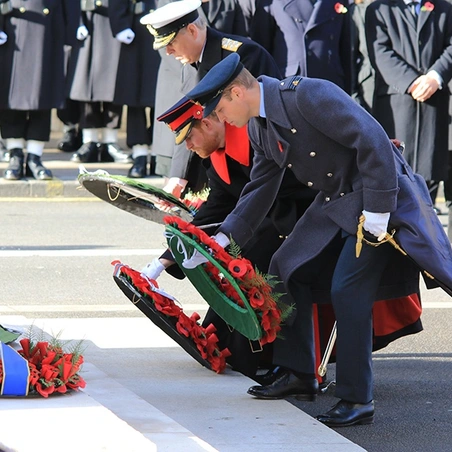 Prince William and Prince Harry laying wreaths at the Cenotaph