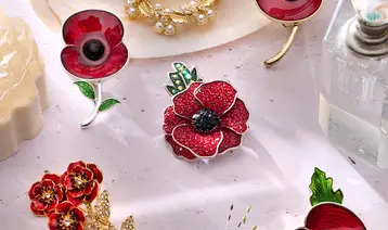 6 Poppy Pins displayed on table