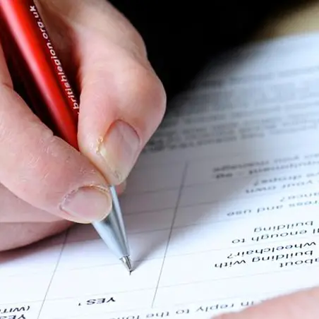 A person filling in a consultation form