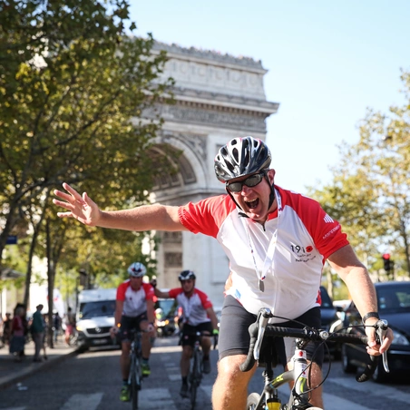 Pedal to Paris 2018 cyclist waving