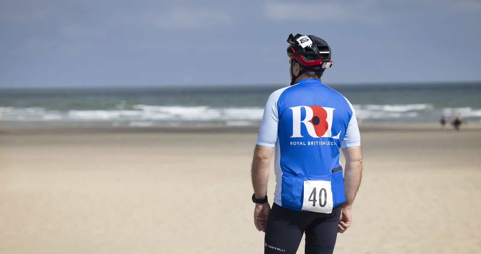 Pedal to Ypres cyclist on beach