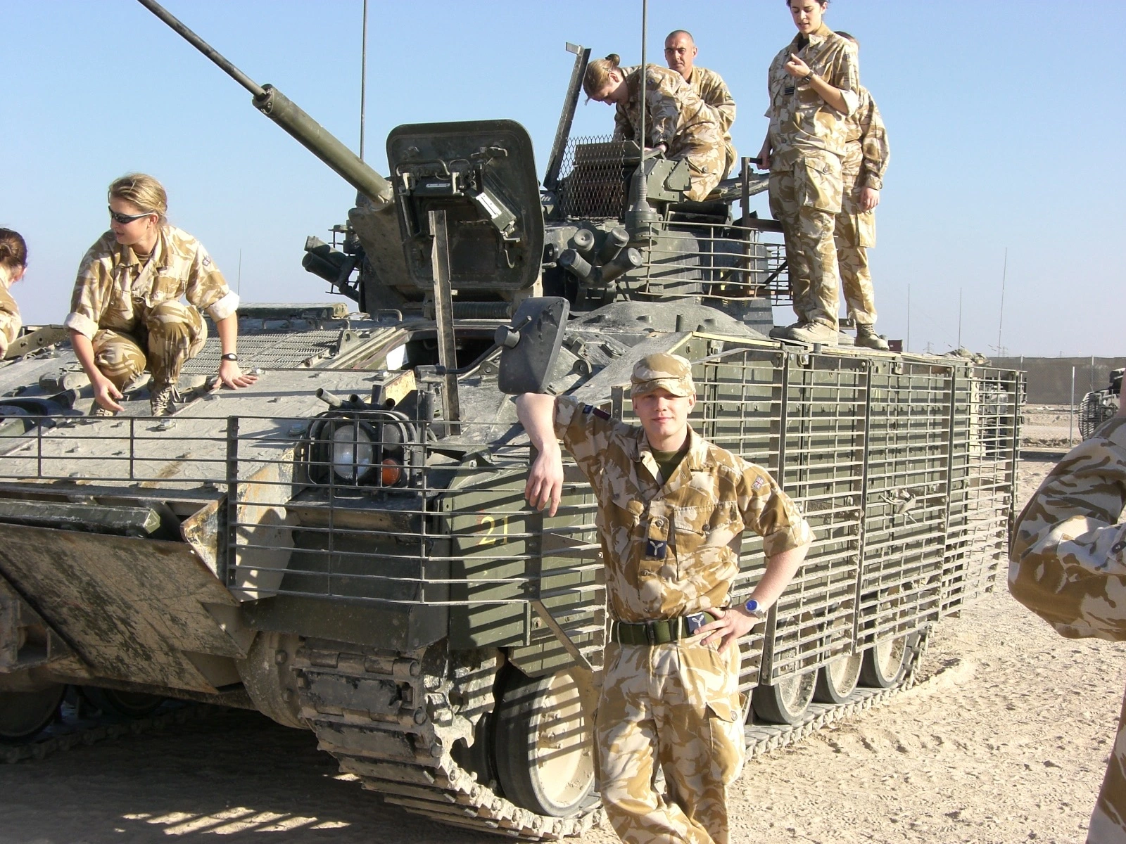 Steve Hooper in front of a tank