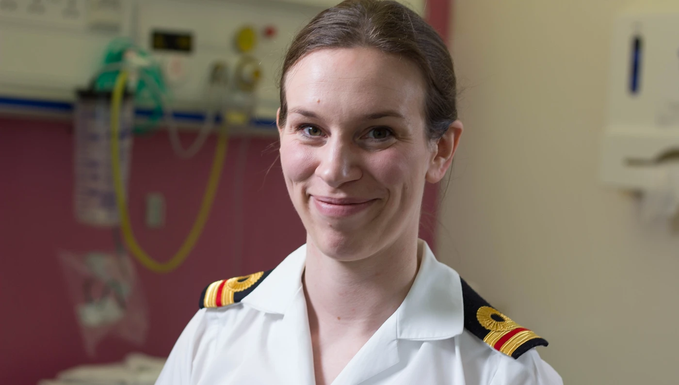Royal Navy Surgeon Lieutenant Katie Newlands at work in a hospital room 