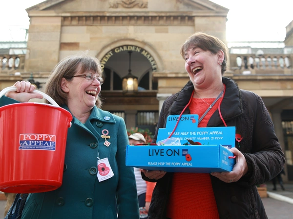 Poppy Appeal volunteers at Covent Garden Market Poppy Appeal volunteers selling the Legion's paper poppies at Covent Garden Market