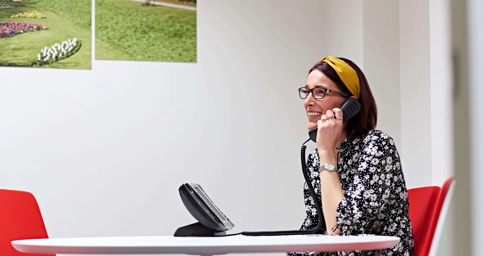 Woman using telephone everyday needs grants Woman using telephone everyday needs grants