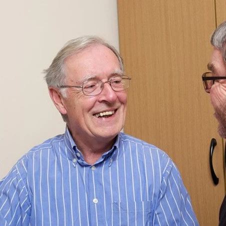 help_with_disability_hero Two men having a meeting