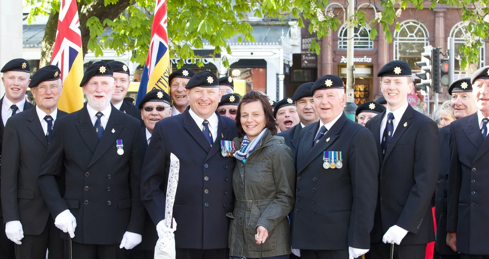 Members of local branch pose wearing medals Members of local branch pose wearing medals