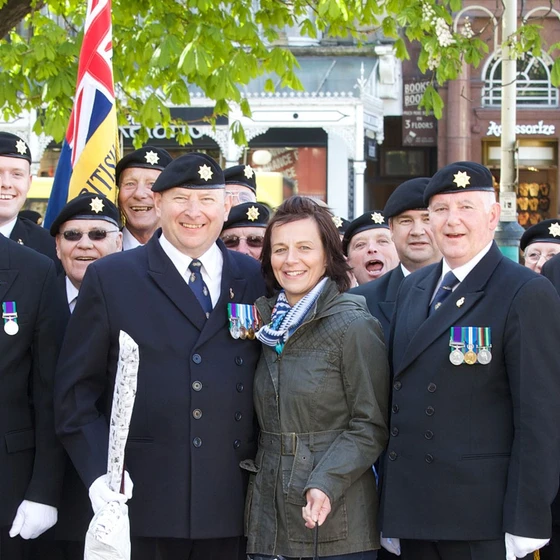 Members of local branch pose wearing medals Members of local branch pose wearing medals