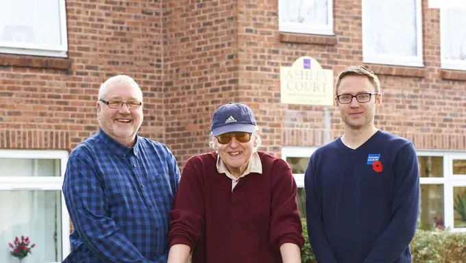 Veteran Terence stands outside his new home after receiving help from a Legion member