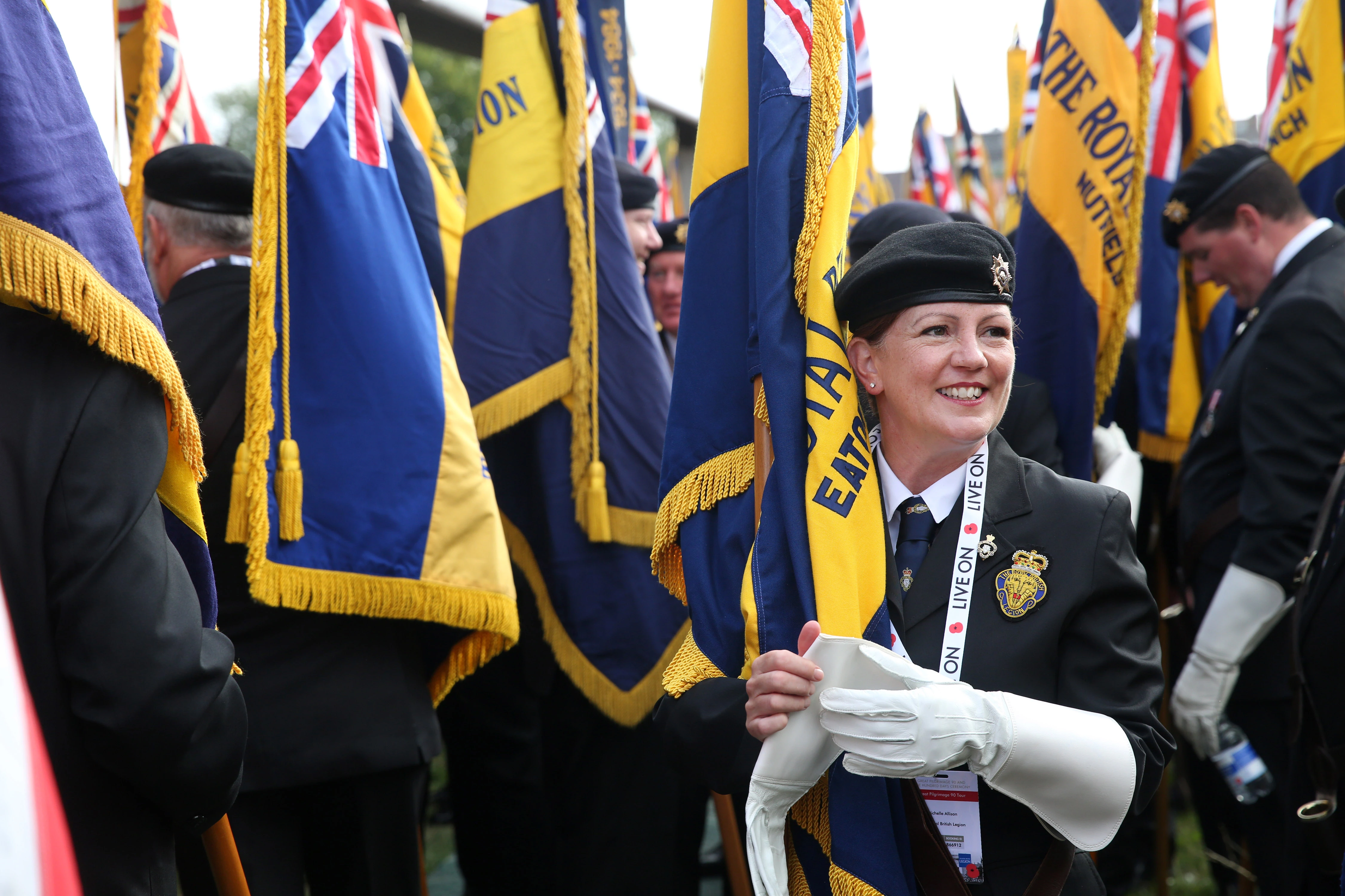 A Royal British Legion branch Standard Bearer preparing for a parade