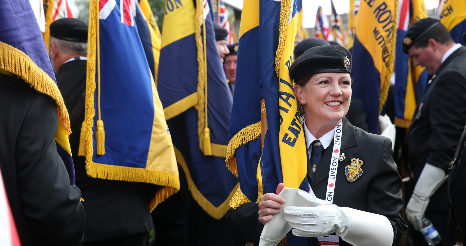 Legion branch Standard Bearer preparing for parade A Royal British Legion branch Standard Bearer preparing for a parade