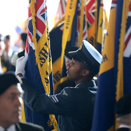 A Standard Bearer preparing for a Remembrance parade