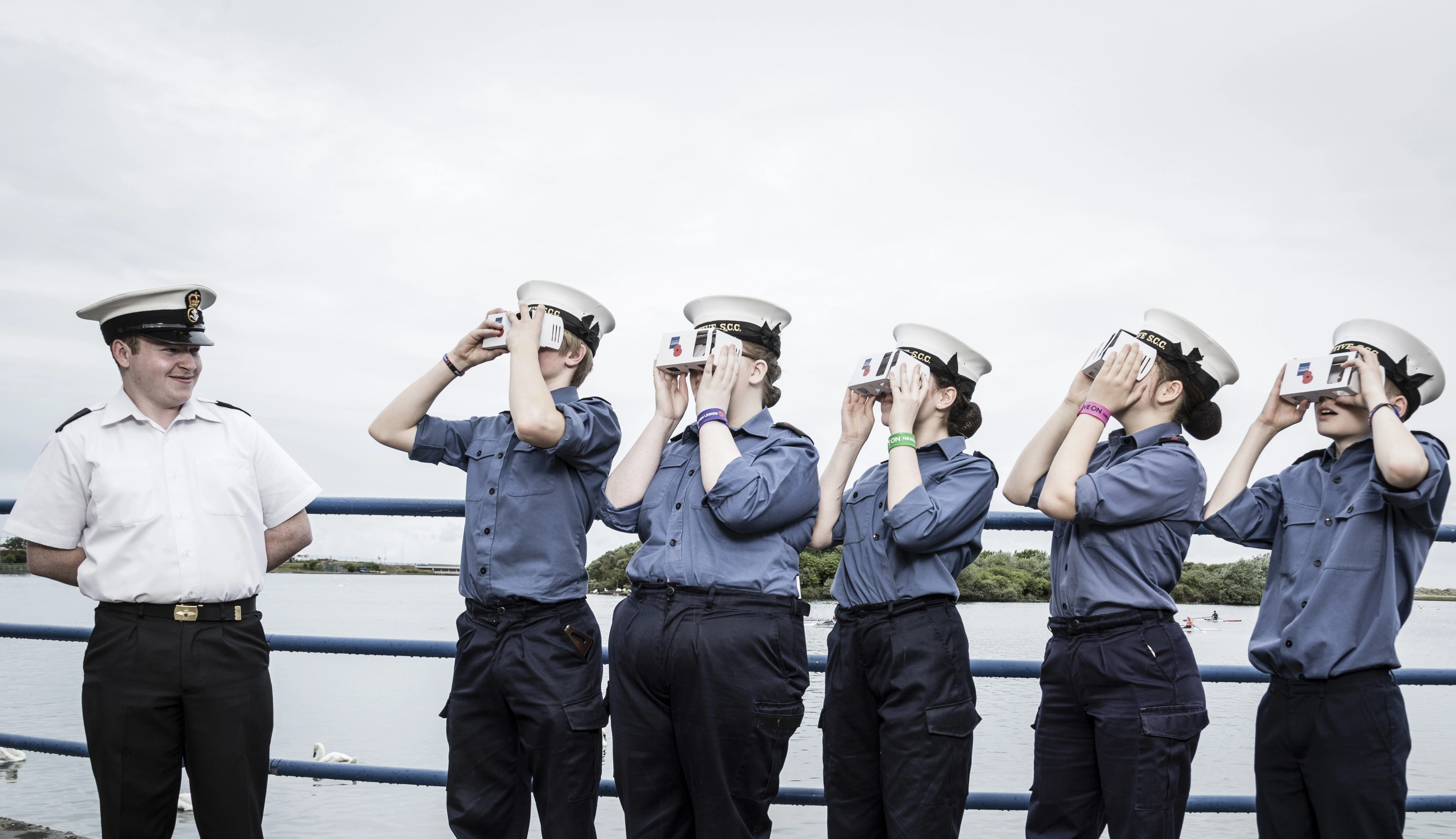 Sea cadets at the Royal British Legion's Annual Conference look through British Legion Virtual Reality glasses 