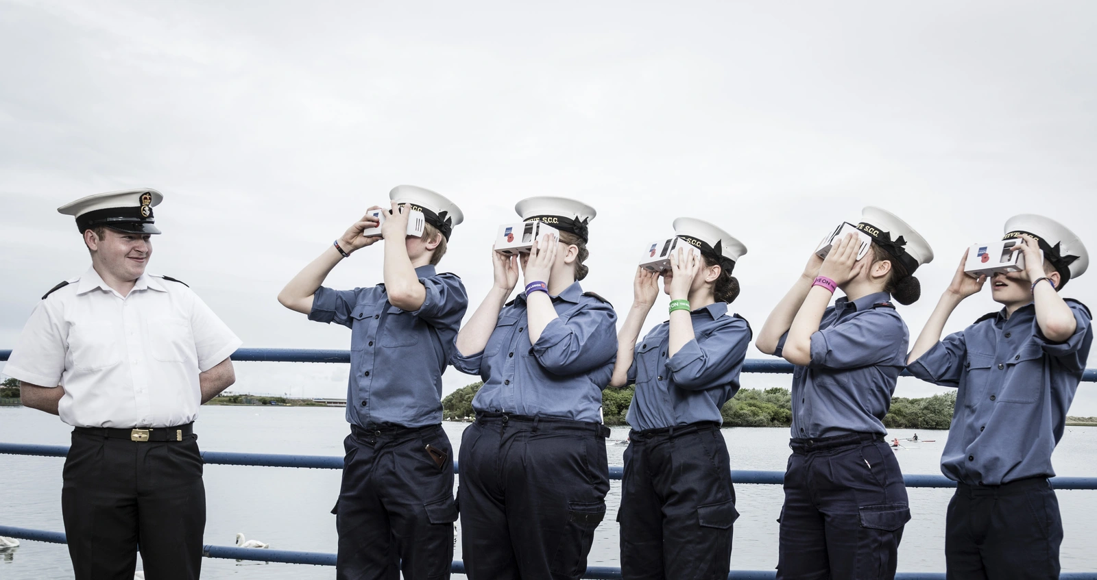 Sea cadets at the Royal British Legion's Annual Conference look through British Legion Virtual Reality glasses 