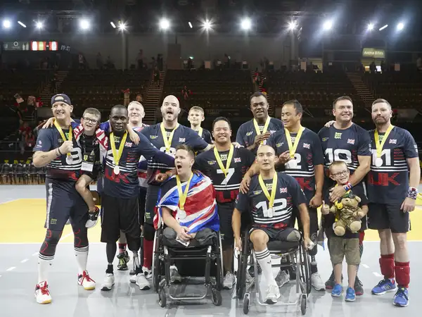 Team UK Invictus basketball team image with their silver medals