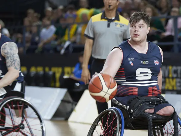 Ryan Hewitt playing at a Basketball event at the Invictus Games