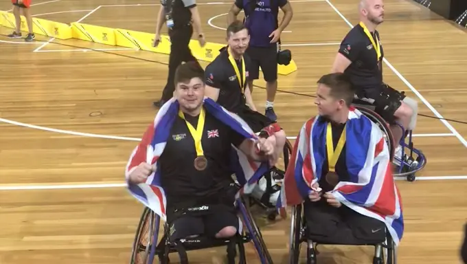 Ryan and a team mate with their bronze Invictus medals