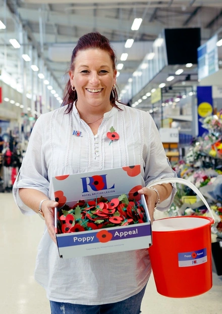 Anne-Marie Cobley with collection bucket_portrait Anne-Marie Cobley with collection bucket