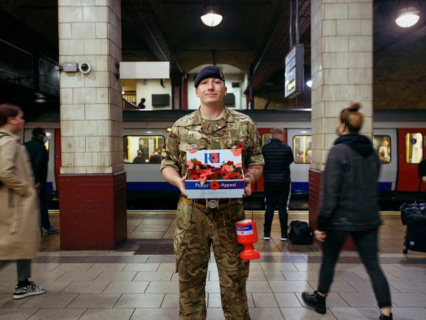 Ashley Martin collecting on the London Underground