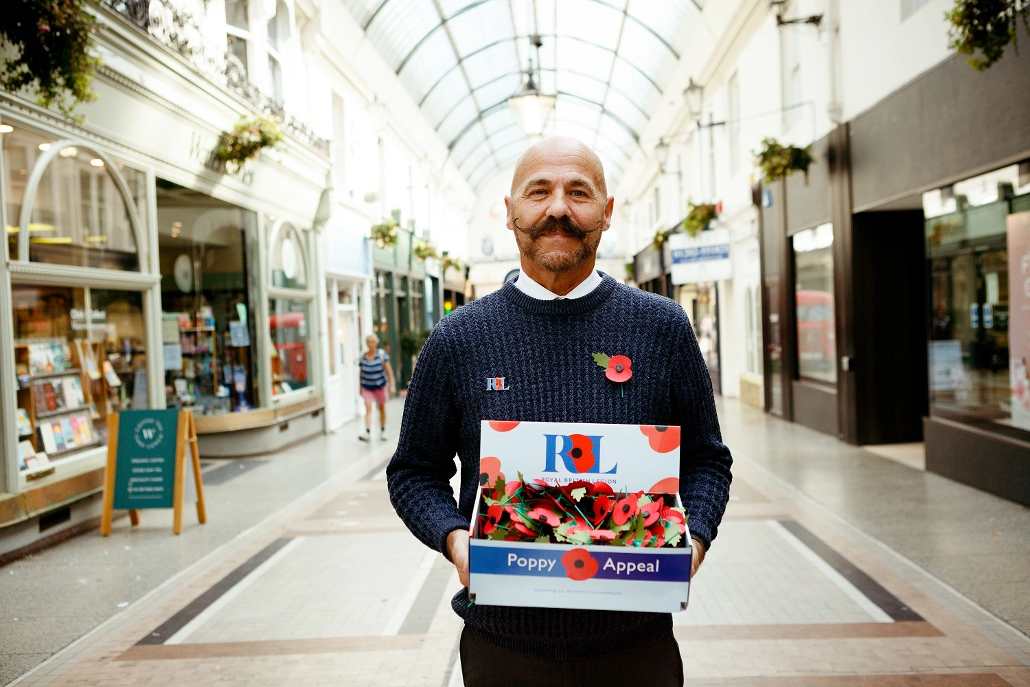 Dave Kelsey holding poppy tray