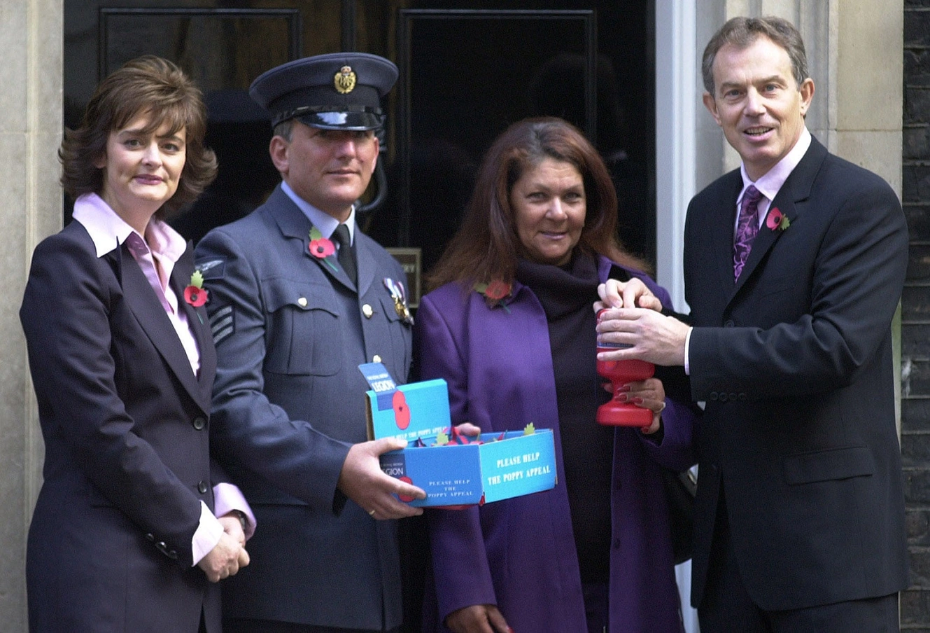 Tony Blair with Poppy Appeal collectors on Downing St in 2002