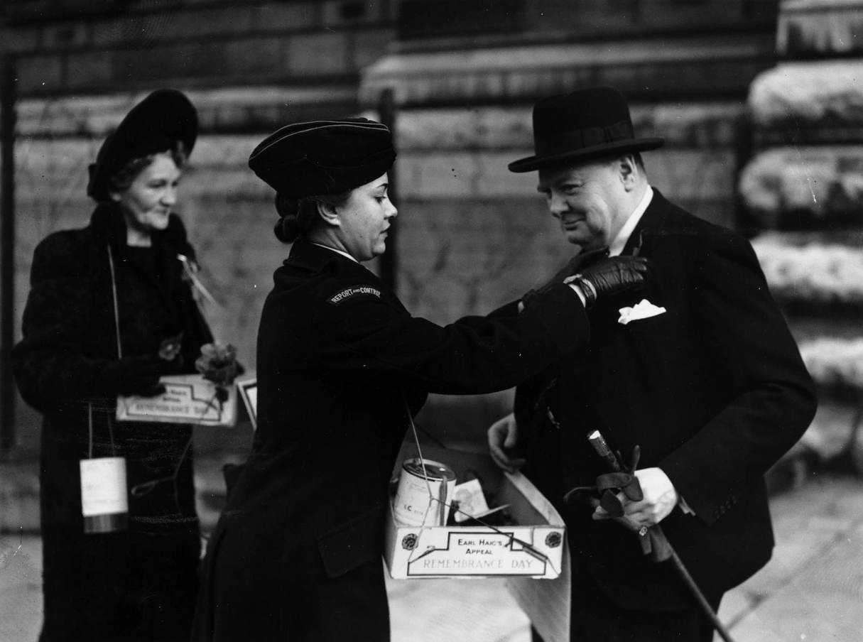 Winston Churchill receiving a poppy in 1943