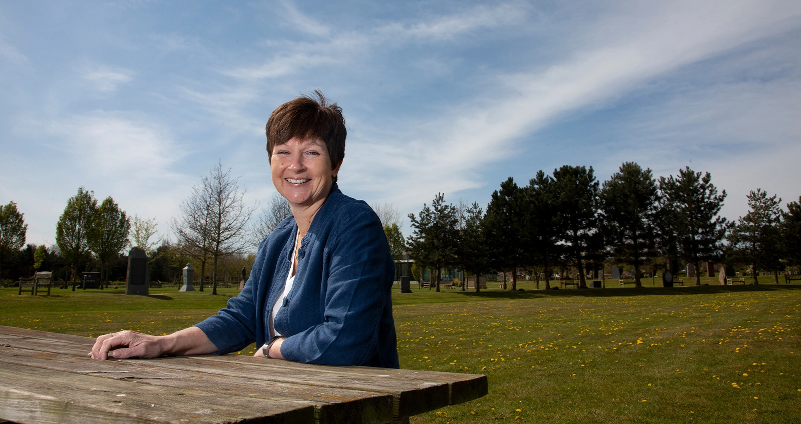 Angela Ham 1 Woman sitting at park bench