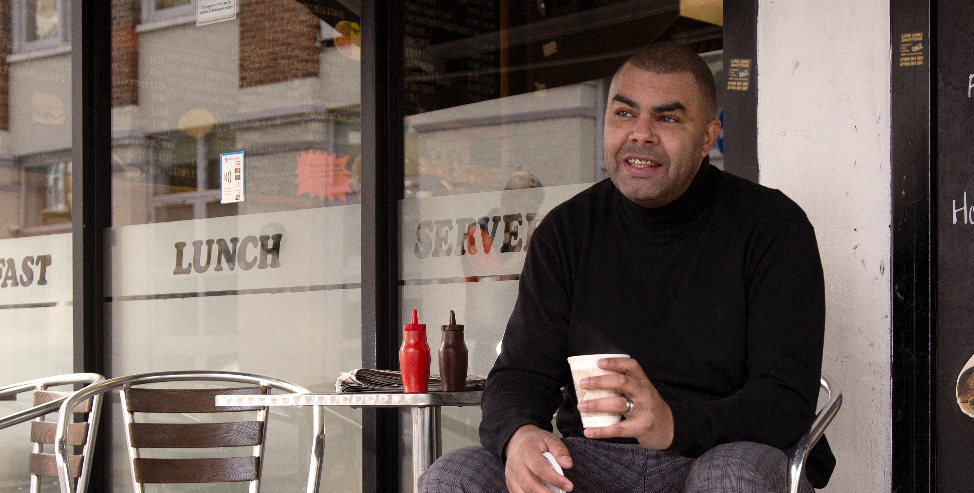 Man with cup of coffee