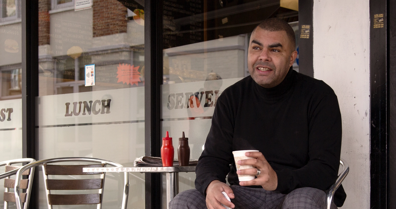 Employee Story_Leroy hero Man with cup of coffee