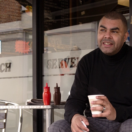 Employee Story_Leroy hero Man with cup of coffee