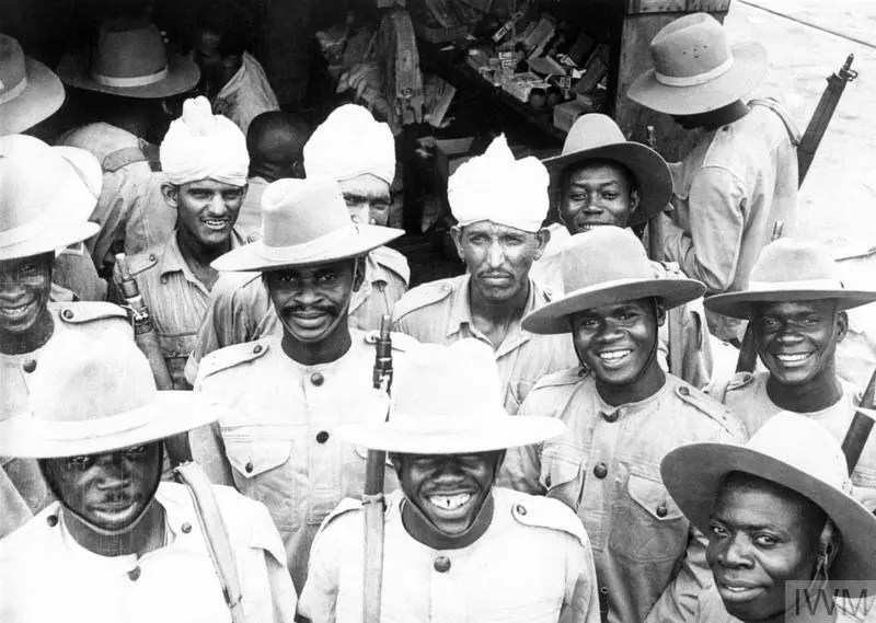 Indian soldiers mingle with troops of the 81st West African Division