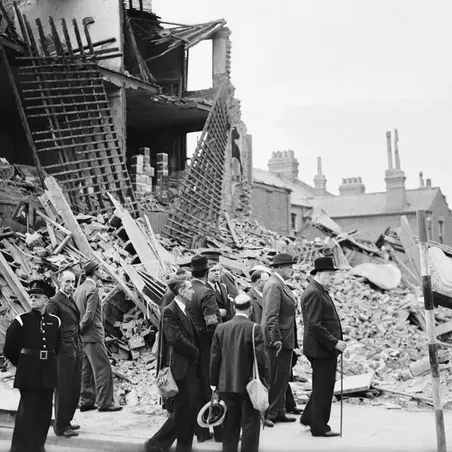 Winston Churchill visits bombed out buildings in the East End of London