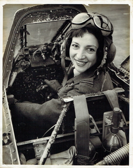 Jackie Moggridge in plane cockpit 1953 