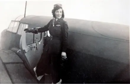 Jackie Moggridge on wing of a plane