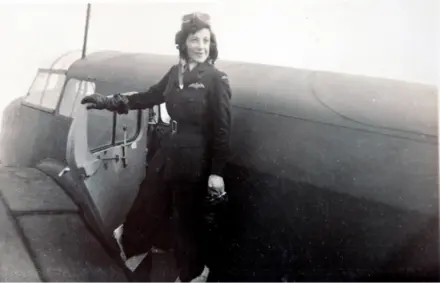 Jackie Moggridge on wing of a plane Jackie Moggridge on wing of a plane