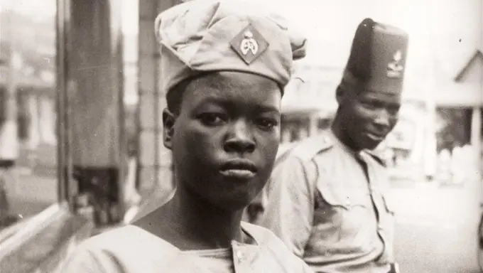 Policewoman in 1940 in Kampala, Uganda Policewoman in 1940 in Kampala, Uganda