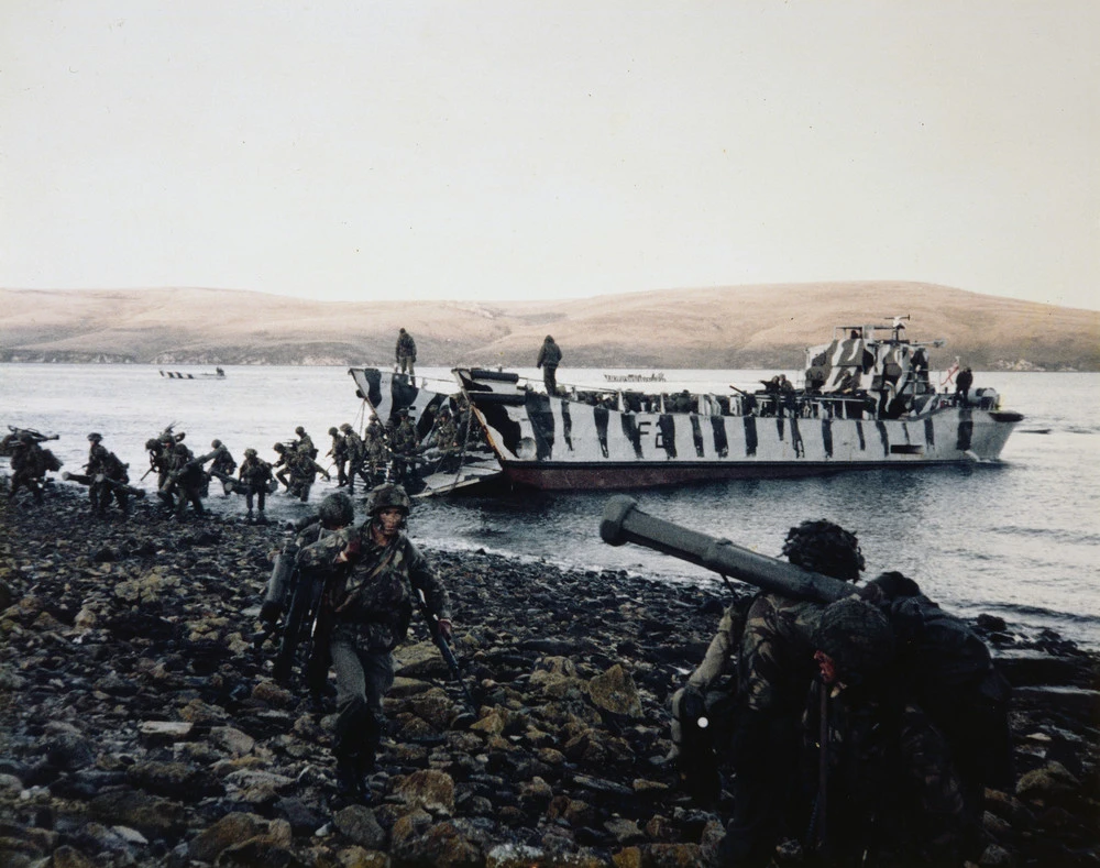 3 Battalion, Parachute Regiment disembark from a landing craft during the landings at San Carlos