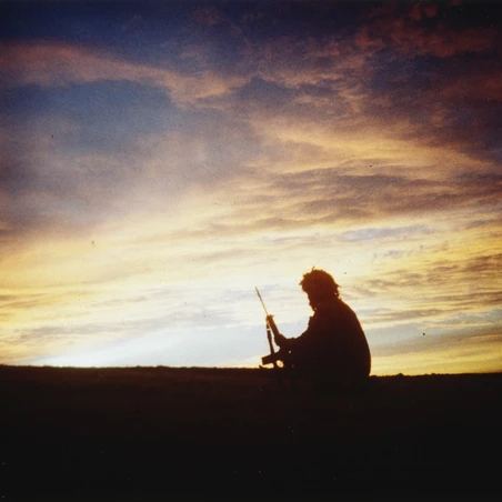 A soldier of 3 Battalion, Parachute Regiment silhouetted against the sunset