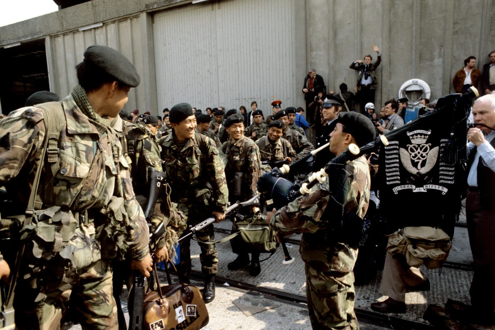 Gurkha Corporal Tamang Kirtiman piping members aboard QE2