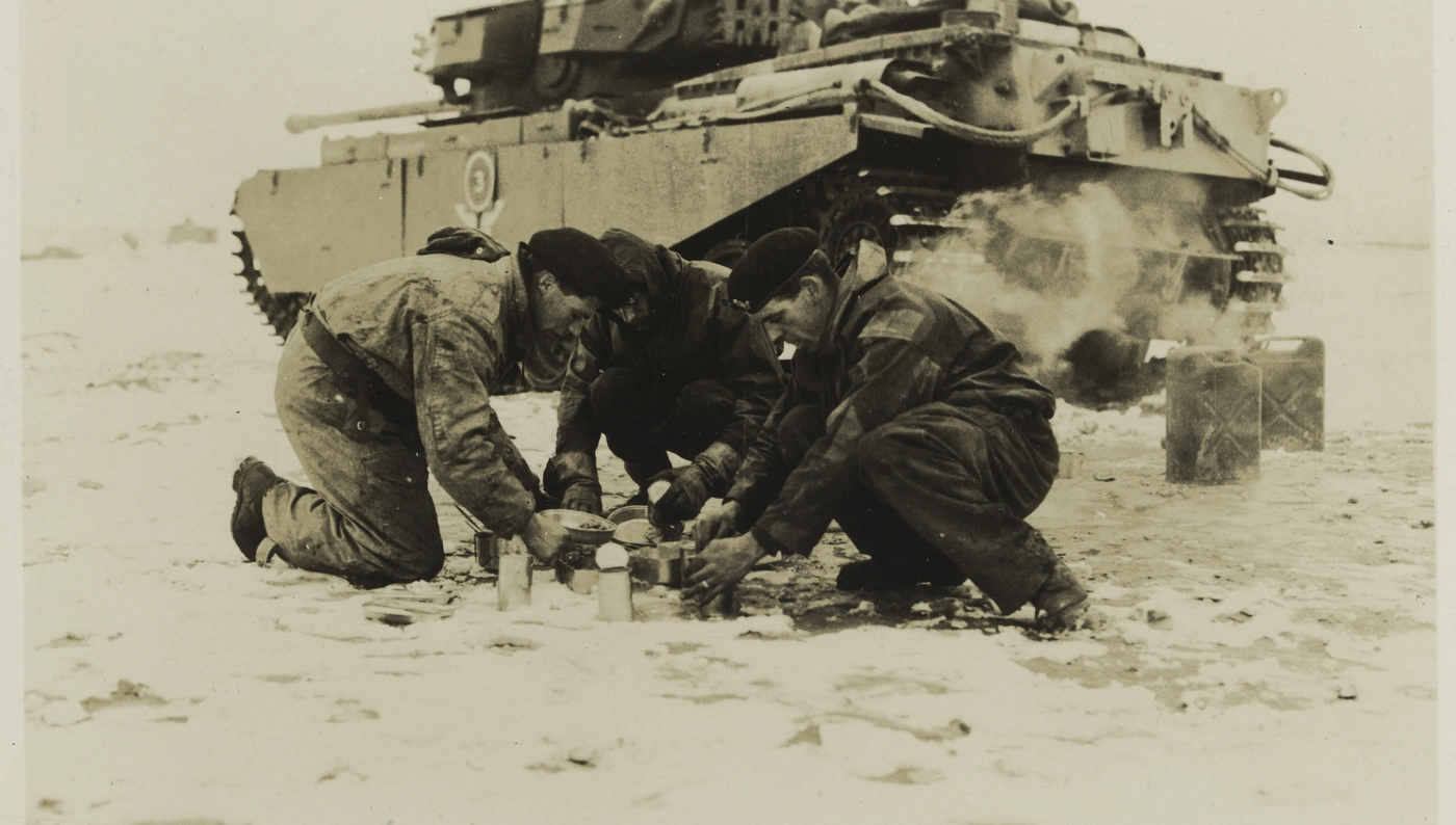 A tank crew from the 8th Hussars make a meal during their service on the Imjin, 1951 - Image courtesy of the National Army Museum, London
