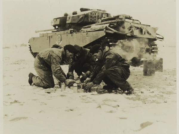 A tank crew from the 8th Hussars make a meal during their service on the Imjin, 1951 - Image courtesy of the National Army Museum, London A tank crew from the 8th Hussars make a meal during their service on the Imjin, 1951 - Image courtesy of the National Army Museum, London